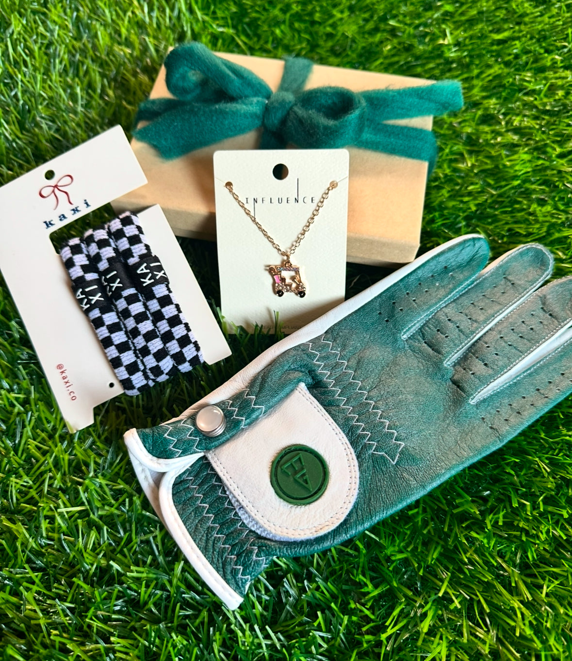 Gift set with glove, cart necklace, and hair ties