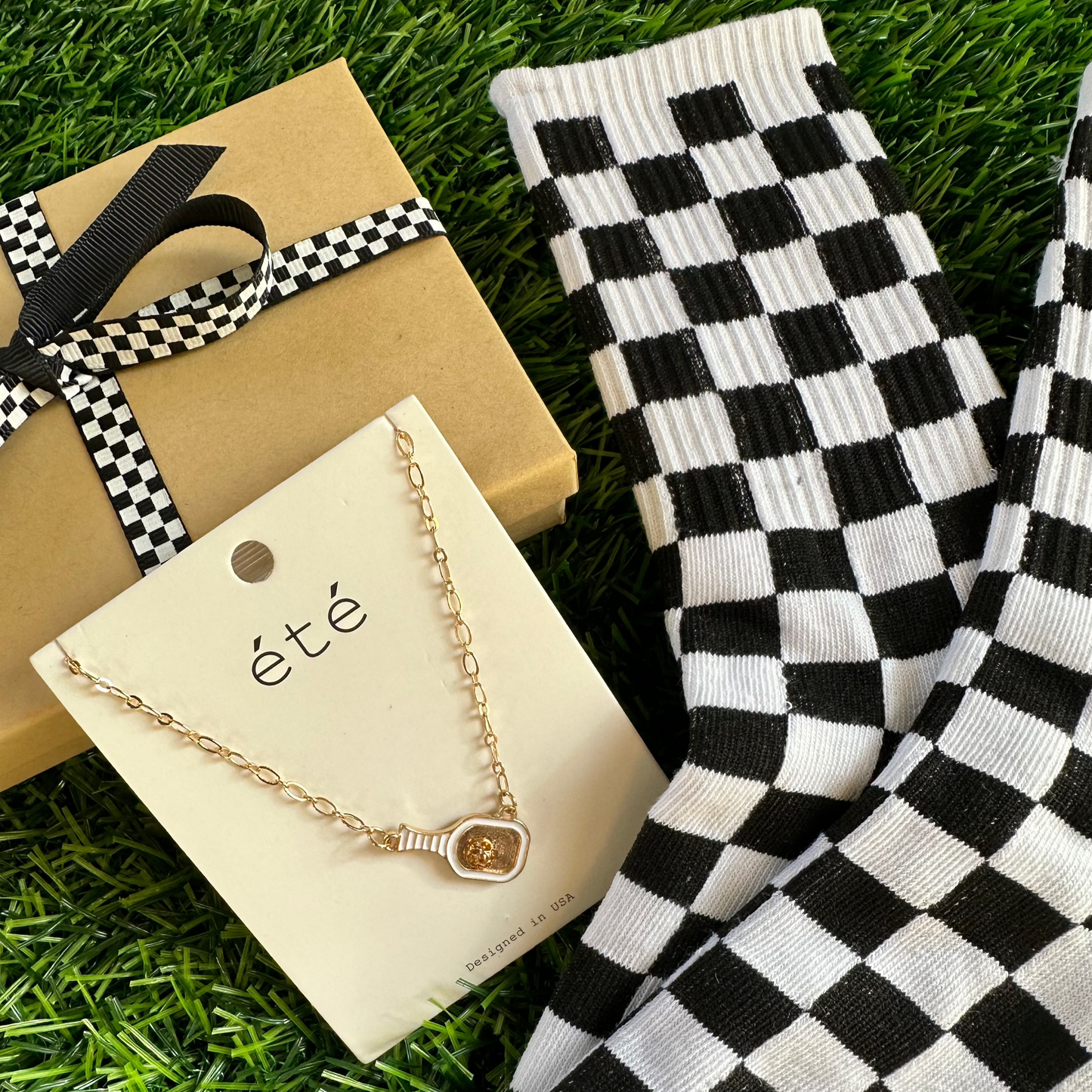 Gift set with white paddle necklace and checkered socks