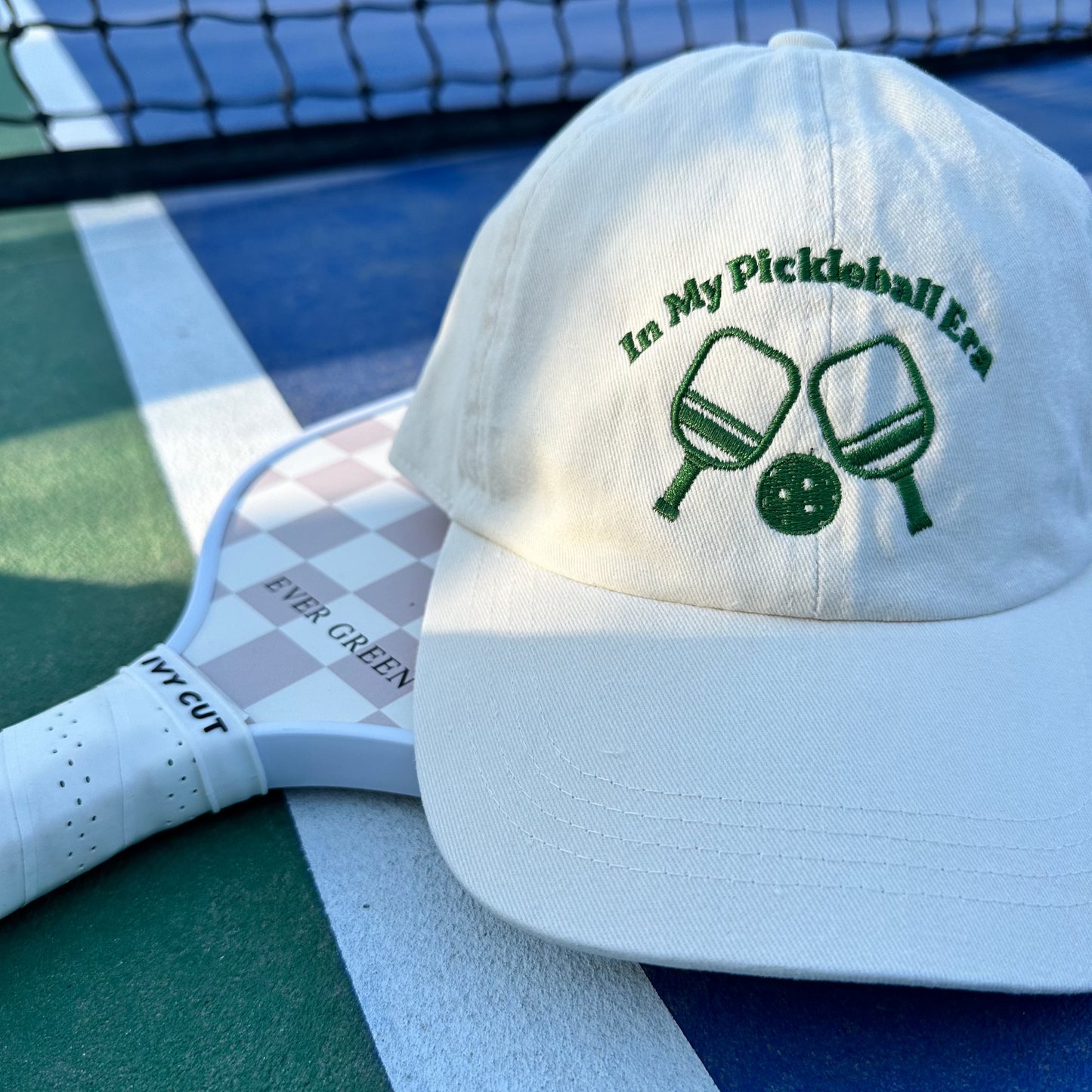 “In my pickleball era” paddles dad hat